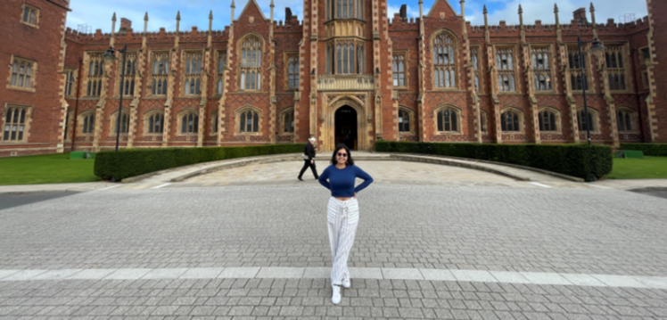 Student Diana Kachman in front of the Lanyon building