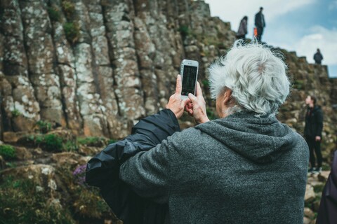 Elderly person on their phone