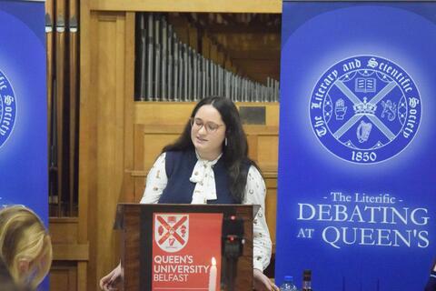 Student Elizabeth speaking at Literific debate