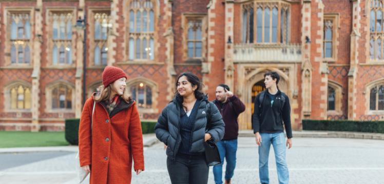 Group of students walking away from the Lanyon building