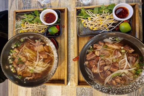 Two bowls of beef pho