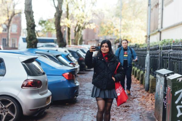 Student Sreyashi takes selfie beside SU
