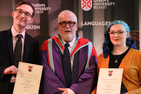 Stephen Kelly with two English students
