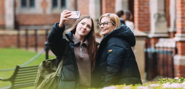Student and parent take selfie
