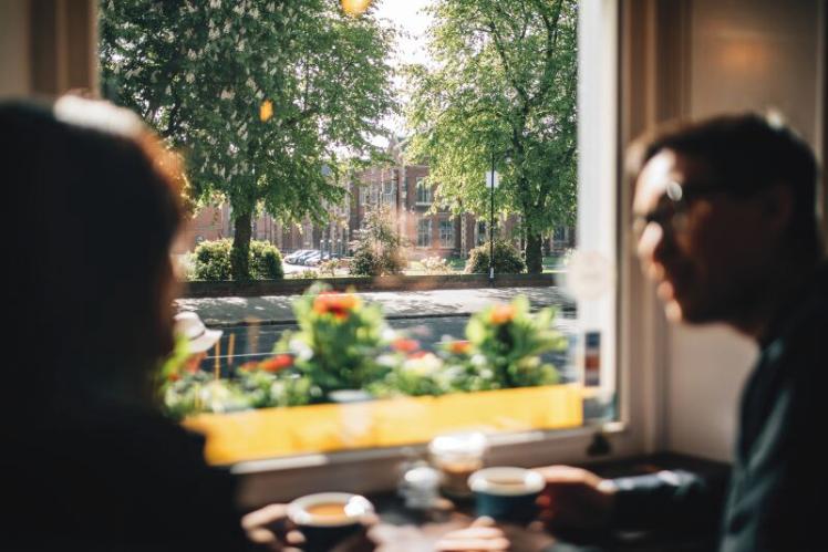 Two students having coffee in The Pocket