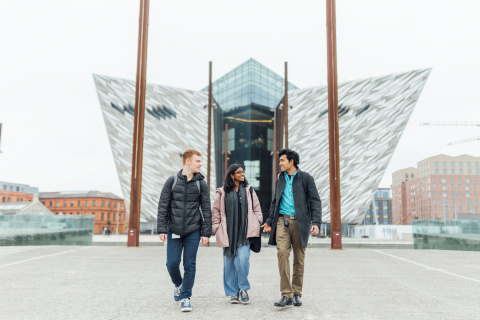 Three students walking away from Titanic Museum