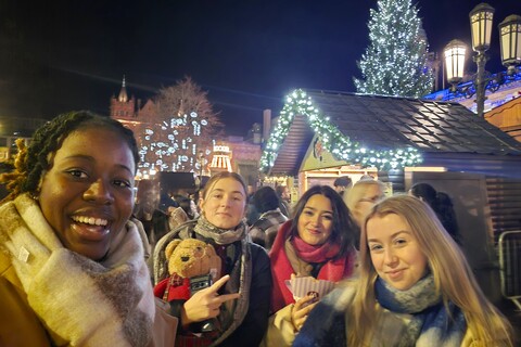 Student Vanessa with three female friends at the Belfast Christmas Market