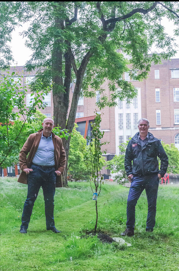 Professor Chris Johnson and Tony Schmidt standing beside a tree